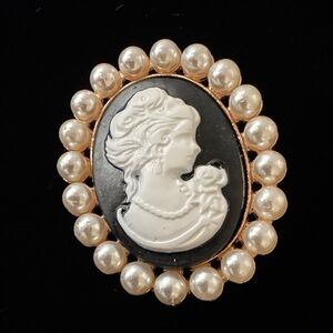 Vintage-Inspired Black and White Cameo Brooch with Pearls